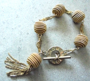 Monet Armband goldfarbend Kugeln mit Hakenverschluss gestempelt/signiert Nr. 496 - Bild 1 von 5