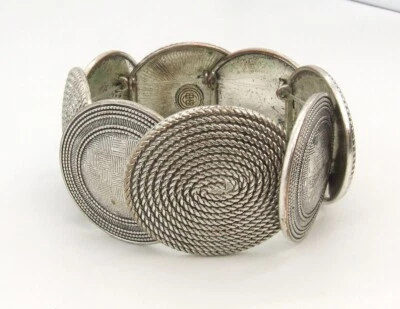 7.5" Chunky Liz Claiborne Silver Shield/Coiled Rope Metal Link Stretch Bracelet Foto 1 de 4