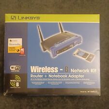 Linksys W11S4PC11 11 Mbps 4-Port 10/100 Wireless B Router + Notebook Adapter