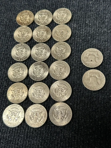 One roll of 18-1964 Kennedy Half Dollars + 2- Franklin Silver Halfs Cover