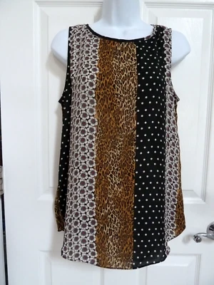 *¡NUEVO!!  CARMEN MARC VALVO Talla Med. Blusa vanguardista con estampado floral de animales* Foto 1 de 3