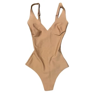 Skims Body ungefüttert Plunge Tanga Body Neu ohne Etikett - XXS - Ton - Bild 1 von 4