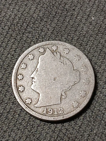 1912-D  Liberty V-Nickel in average circulated condition Cover