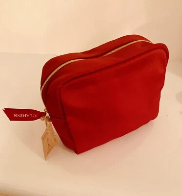 Bolsa de cosméticos Clarins tela súper suave reciclada hecha de botellas de plástico  Foto 1 de 2