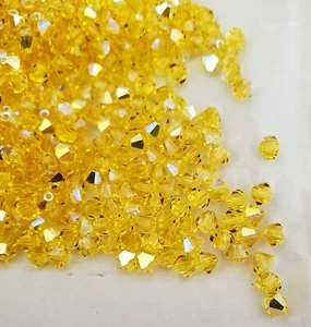 Swarovski Crystal 5328 4mm bicone beads, Citrine AB (48pcs) - Picture 1 of 3