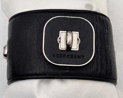 Pulsera ancha Longchamp de cuero negro, herrajes plateados Foto 1 de 4