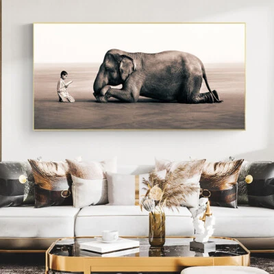 Pôsteres e impressões de arte de parede pintura em tela menino lendo na frente de elefante - Imagem 1 de 4
