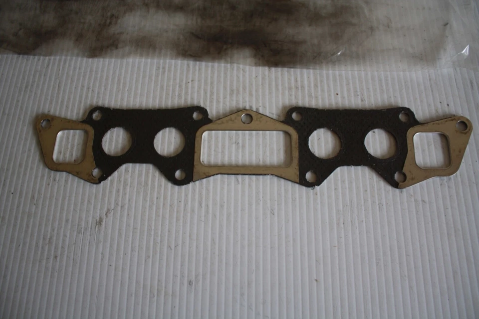 JUNTA COLECTOR NISSAN 14035-H7400 OEM 1979-1981 NISSAN DATSUN 310 1,4 L 4 CILINDROS Foto 1 de 1