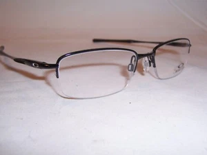 NUEVAS GAFAS OAKLEY CLUBFACE OX 3102-01 NEGRAS 52mm RX AUTÉNTICAS 3102 - Imagen 1 de 7
