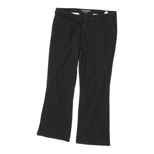 Pantalones negros Dickies para mujer | Ropa de trabajo vintage utilitaria pantalones bootcut duraderos - Imagen 1 de 5
