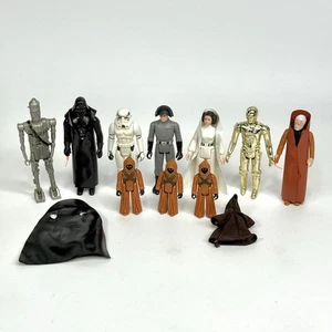 Star Wars Kenner 1977 (9) 1980 (1) Actionfigur 10 Stück Darth Vader xtra Cape - Bild 1 von 24