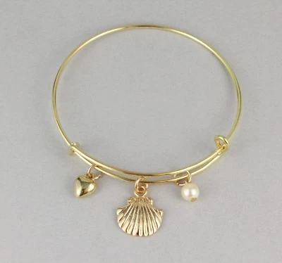 Pulsera concha concha de ostra imitación perla brazalete expandible fino delgado dorado Foto 1 de 4