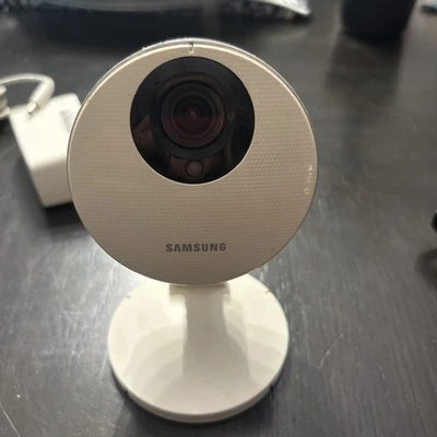 Cámara inteligente Samsung SNH-P6410BN y adaptador de corriente Foto 1 de 4