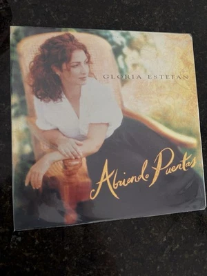 GLORIA ESTEFAN “ ABRIENDO PUERTAS “ EPIC-SONY 🎶LA PARRANDA 🎶VG+ VINYL - Image 1 of 4