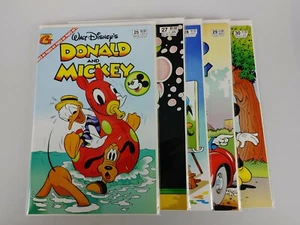 Lote de 5 cómics de Disney de Donald y Mickey #25 #27-30 - con manga y respaldo - Imagen 1 de 7