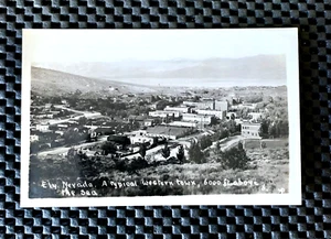 ELY NEVADA A TYPICAL WESTERN TOWN 6000 FT ABOVE THE SEA RPPC REAL PHOTO POSTCARD - Picture 1 of 2