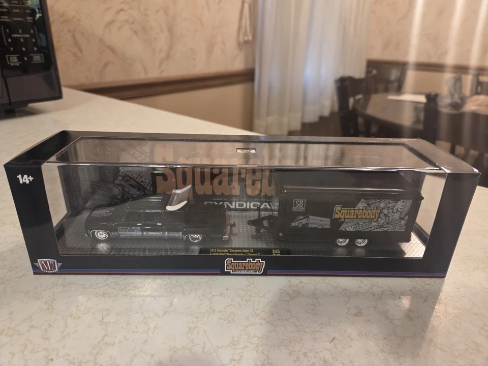 M2 Machines 1973 Chevy Cheyenne Super 30 & GMC Sierra Grand Syndicate Squarebody - Image 1 of 1