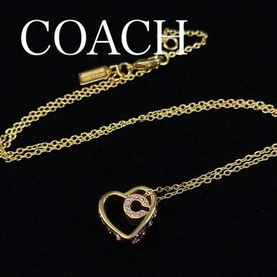 Auténtico collar corazón COACH línea firma piedra oro Foto 1 de 4