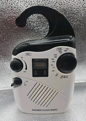 AM/FM Shower Clock Radio; Black over white; needs 4 AA Batteries; WORKS!! - Image 1 of 4