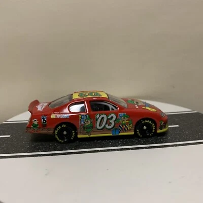 Team Caliber NASCAR Holiday '03 ELF 2003 Chevy Monte Carlo Sam Bass Art rojo 1:64 Foto 1 de 4