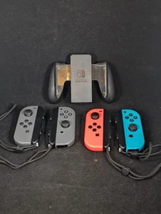 Nintendo Switch Joy Con Controller 2 Paar & 1 Griff - Bild 1 von 9