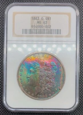 1883 O $1 Morgan Silver Dollar NGC MS63 Rainbow Textile Toned - Image 1 of 4