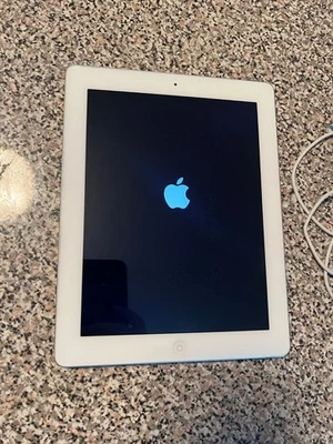 Apple iPad Modelo A1458 4ta Generación 32GB Wi-Fi (MD511LL/A) Blanco y Plateado Foto 1 de 4