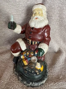 Coca-Cola de hierro fundido vintage Santa fecha bancaria: parece 2 de febrero de 1875 PAT - Imagen 1 de 5