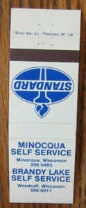 CUBIERTA DE CERILLAS DE GASOLINERA ESTÁNDAR MINOCQUA: MINOQUA & WOODRUFF, WISCONSIN E22 - Imagen 1 de 2