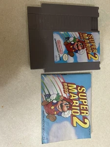 Super Mario Bros 2 - Carrello e Manuale Nintendo NES Autentico e Funzionante - Foto 1 di 6