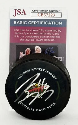 Jared Spurgeon signed Minnesota Wild Official Game Puck autographed JSA - Image 1 of 2