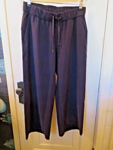 EXCELENTE TALLA 6 Lululemon Cordón Corte Pantalones Negro Flowey Pierna Ancha L107 - Imagen 1 de 6