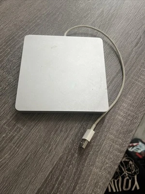 Reproductor de DVD externo Apple SuperDrive plateado USB Foto 1 de 2
