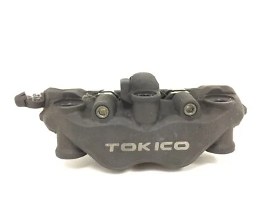 Pinza de freno delantera izquierda Honda CBR1000RR CBR600RR OEM Tokico con pastillas - Buena Foto 1 de 4