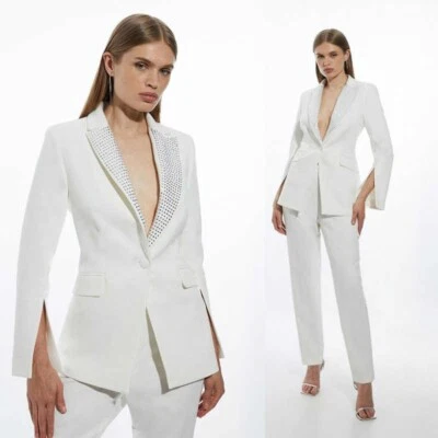 Traje de moda blanco para mujer proceso de perforación de alta resistencia blazer pantalones de corte recto Foto 1 de 4