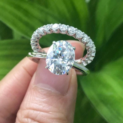 3.89 TCW Oval Cut Moissanite Bridal Set Engagement Ring in 14K White Gold Plated - Image 1 of 4