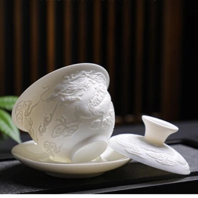 Taza en relieve dragón fénix porcelana blanca Gaiwan porcelana en grandes ventas Foto 1 de 4