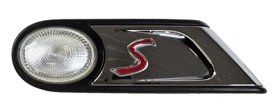 Mini Cooper 2009 OEM guardabarros izquierdo lámpara giratoria con emblema Foto 1 de 4