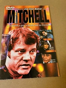 Mitchell a Cop with a Gun , a Drink and DVD - Picture 1 of 5