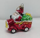 Santa In Red Fire Truck Blown Glass Christmas Ornament