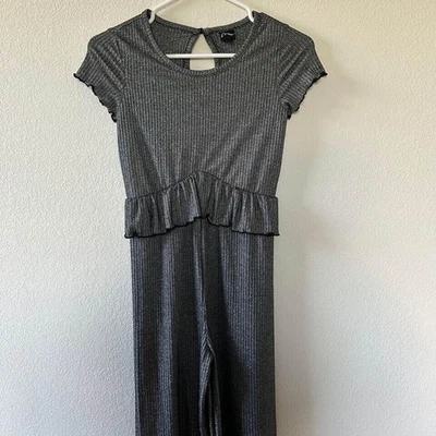 Mameluco de niña Art Class negro y plateado usado en excelente estado talla 7/8 Foto 1 de 3