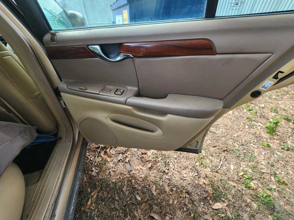 2000 2001 02 2003 2004 2005 CADILLAC DEVILLE RIGHT REAR INTERIOR DOOR PANEL TAN - Image 1 of 1