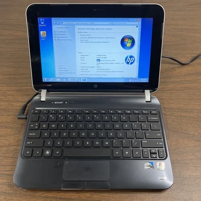 Netbook PC portátil y cargador Hewlett-Packard HP Mini 210-4150NR (batería defectuosa) Foto 1 de 4