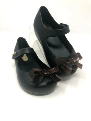 Mini Melissa Girls Black Tortoise Brown Bow Ultragirl Flat Shoes 7 - Image 1 of 4