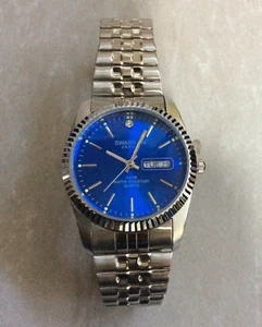 SWANSON Men's Watch Round Blue Date Dial Silver Index Hours Silver Stretch Band! - Picture 1 of 2