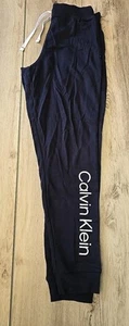 Calvin Klein Joggers Donna French Terry Iconic CK Logo Navy Taglia S NUOVO - Foto 1 di 3