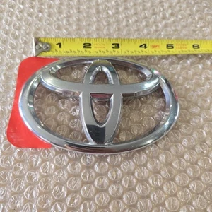 Toyota Emblem Fitment Unknown (Was New, Has Scratches) E121 - Picture 1 of 2
