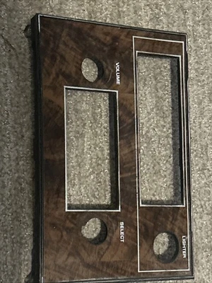 1971 1976 Oldsmobile Cutlass / 442 Woodgrain Radio Bezel Trim Panel OEM GM - Image 1 of 4