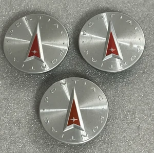 (3) Pontiac Center Caps 9593169 , 9594156 ,  9595157 , 2-5/16" wide on front - Picture 1 of 6