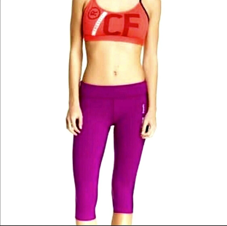  LEGGINGS CAPRI ENTRENAMIENTO REEBOK CHASE Foto 1 de 3